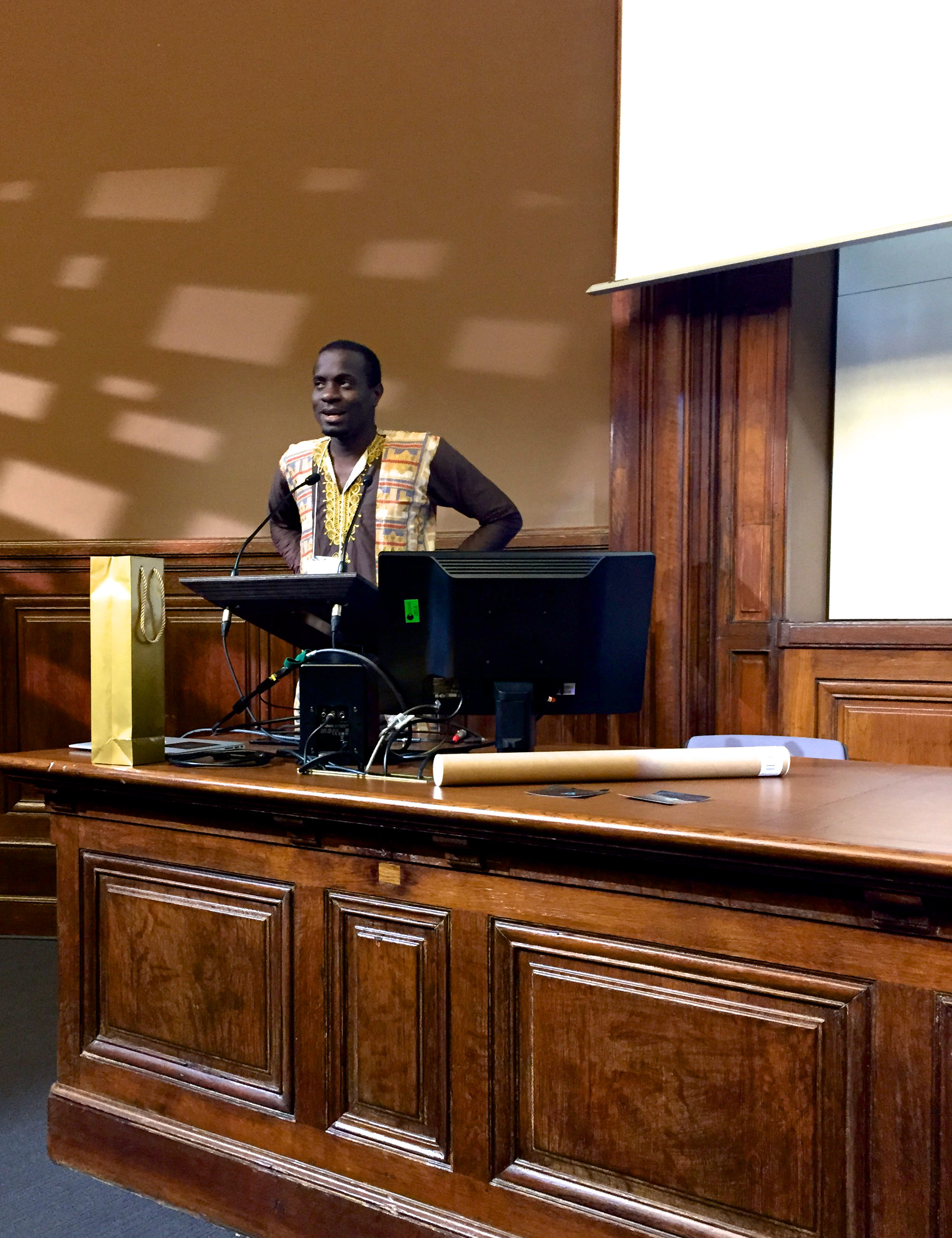 Sage Scholar Femi Longe, from Open Living Labs, is shown speaking at the Paris Sage Assembly, April 18, 2015.